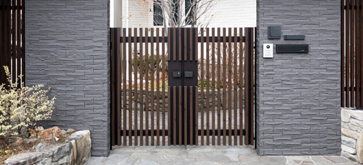 Increase the privacy of your home and garden with automated wooden gates